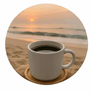 Driftwood Dawn Coffee Co. ceramic mug beside a journal and pen in natural morning light, evoking a peaceful start to the day